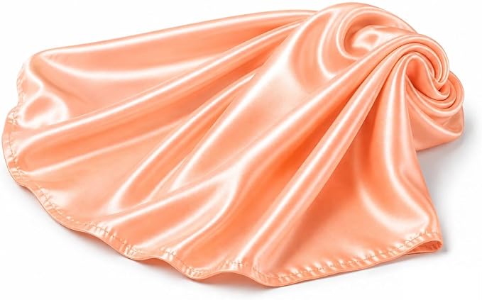 Peach stretch charmeuse satin fabric, draped detail